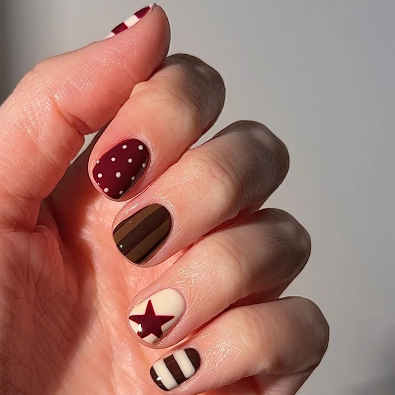 Artful Nail Art with Striped and Polka Dot Pattern Stornfield
