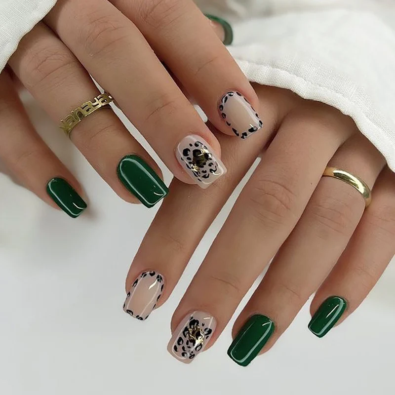 Artful nail art with tasteful green and leopard accents Stornfield