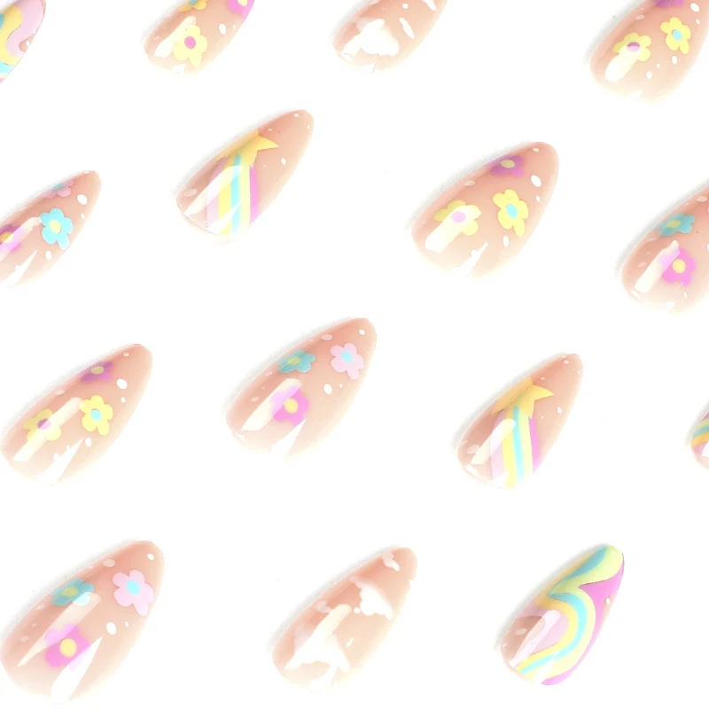 Artful nail art with cheerful designs and colorful accents Stornfield