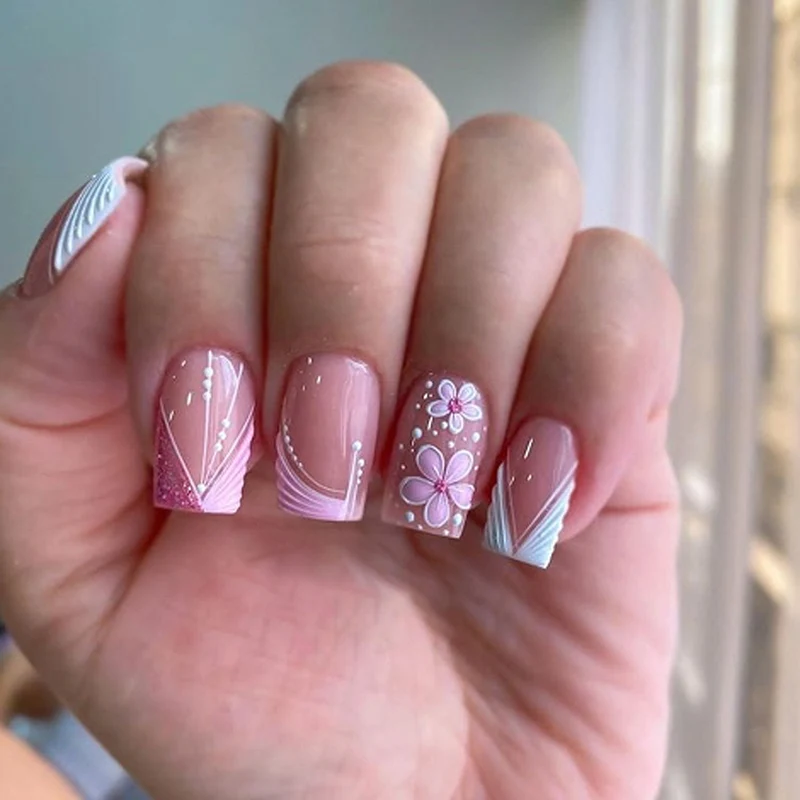 Artful Nail Art with Floral Decorations Stornfield