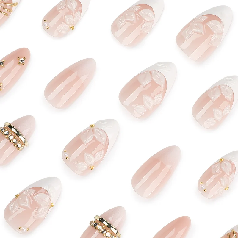 Artful nail art with floral and rhinestone accents Stornfield