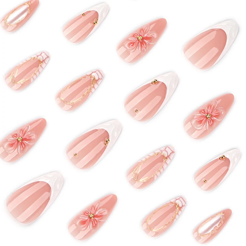 Artful nail art with floral and golden accents Stornfield