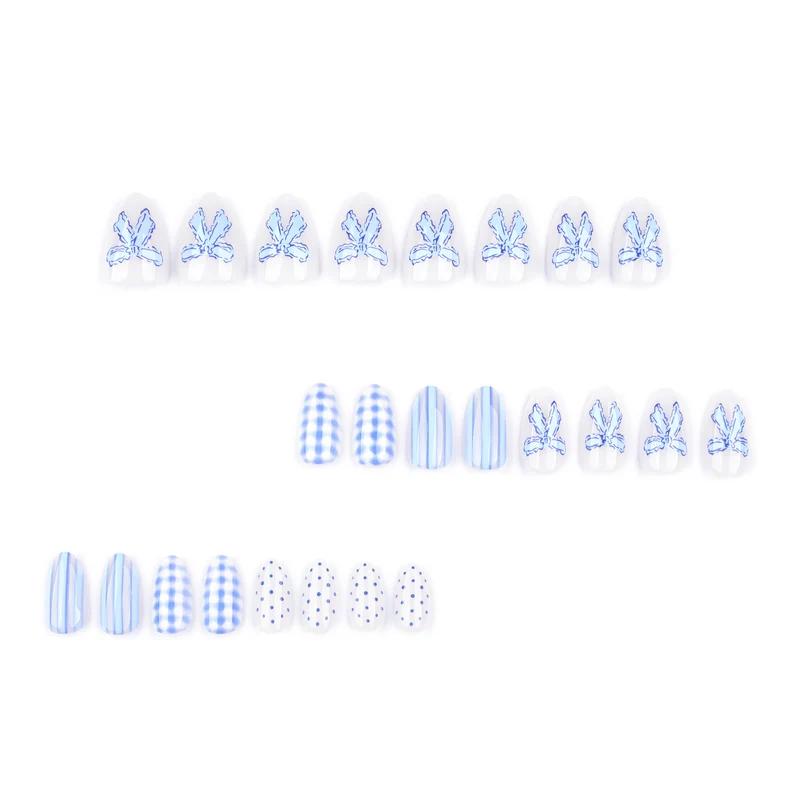 Artistic Nail Art with Floral and Polka Dot Designs Stornfield