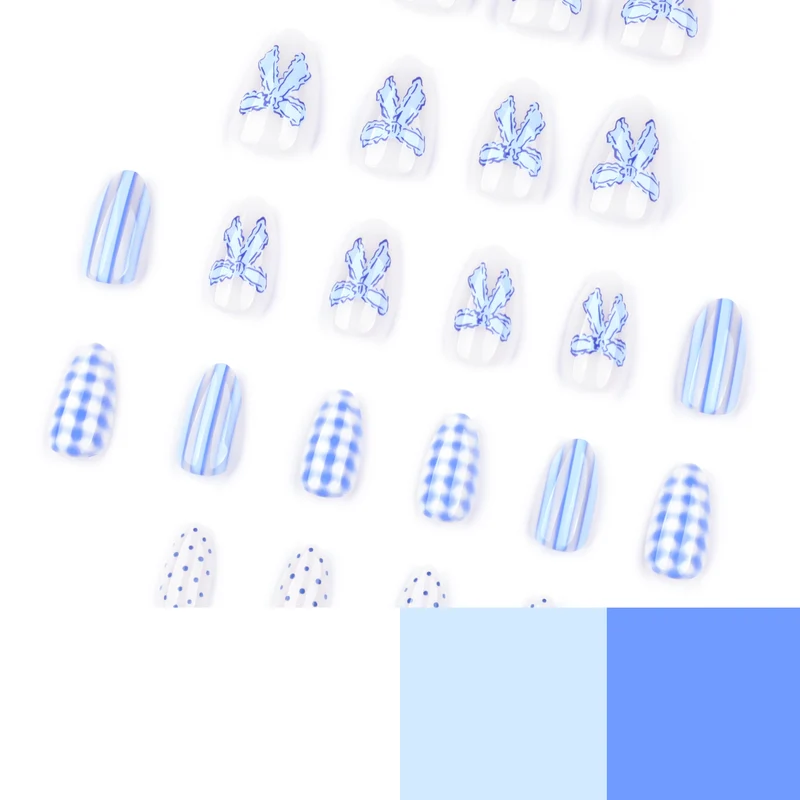 Artistic Nail Art with Floral and Polka Dot Designs Stornfield