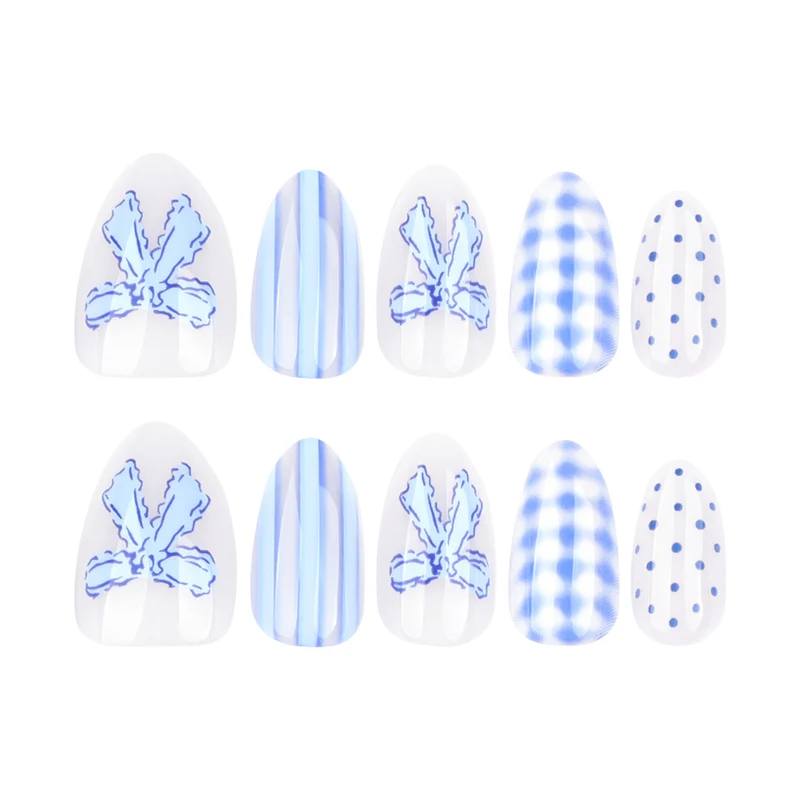 Artistic Nail Art with Floral and Polka Dot Designs Stornfield