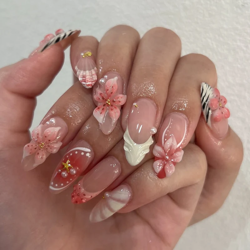 Artistic Nail Art with Floral and Elegant Accents Stornfield