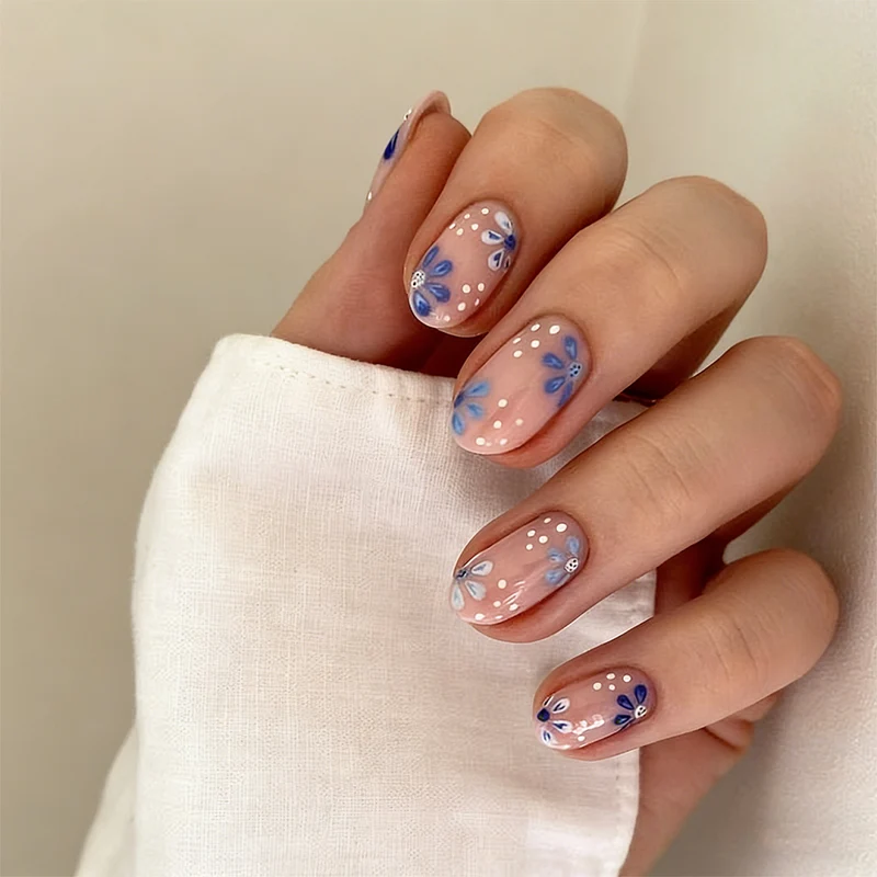 Artful Nail Art with Floral Patterns Stornfield