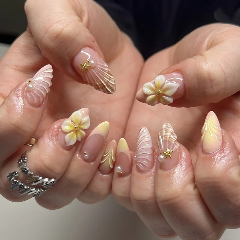 Artful nail art with floral motifs and elegant accents Stornfield