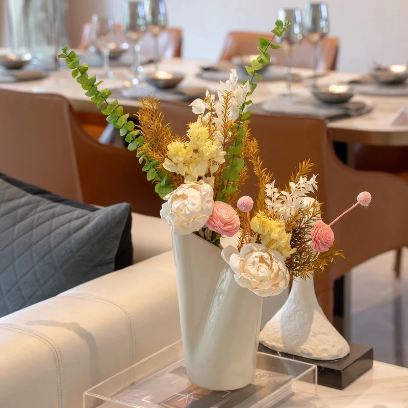 Elegant Dried Floral Arrangement in Contemporary Vase