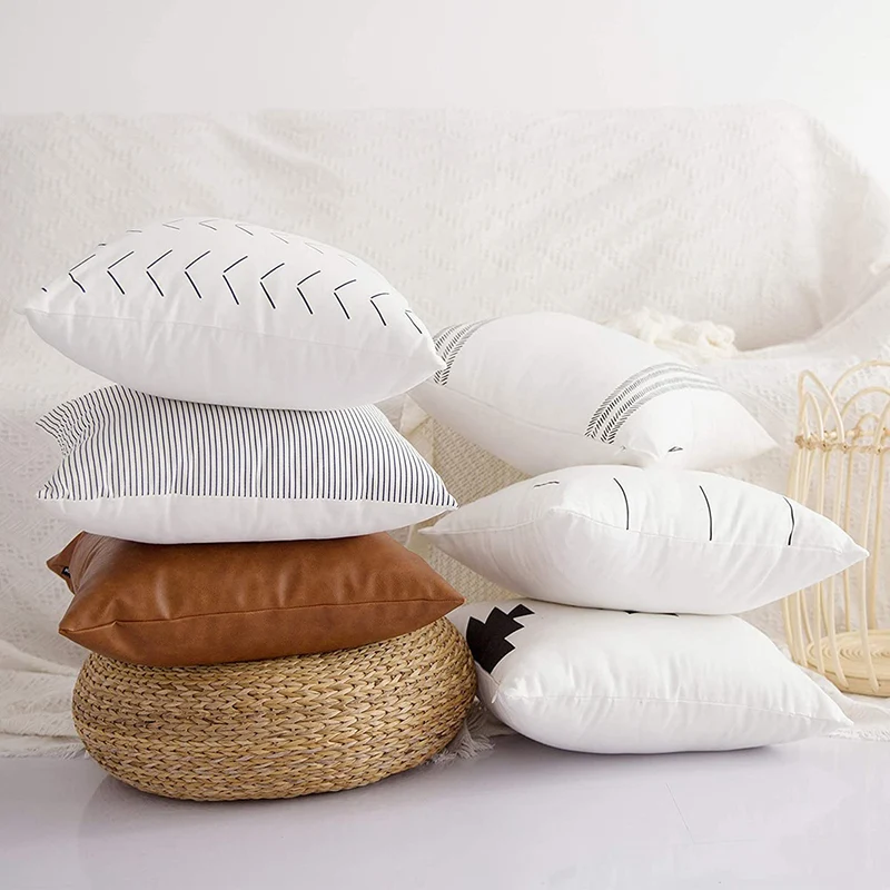 Square cushion cover made of cotton-linen with graphic arrow and stripe pattern Stornfield