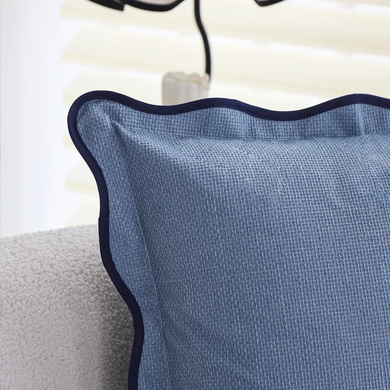 Square cushion cover made of breathable waffle fabric with decorative wavy piping Stornfield