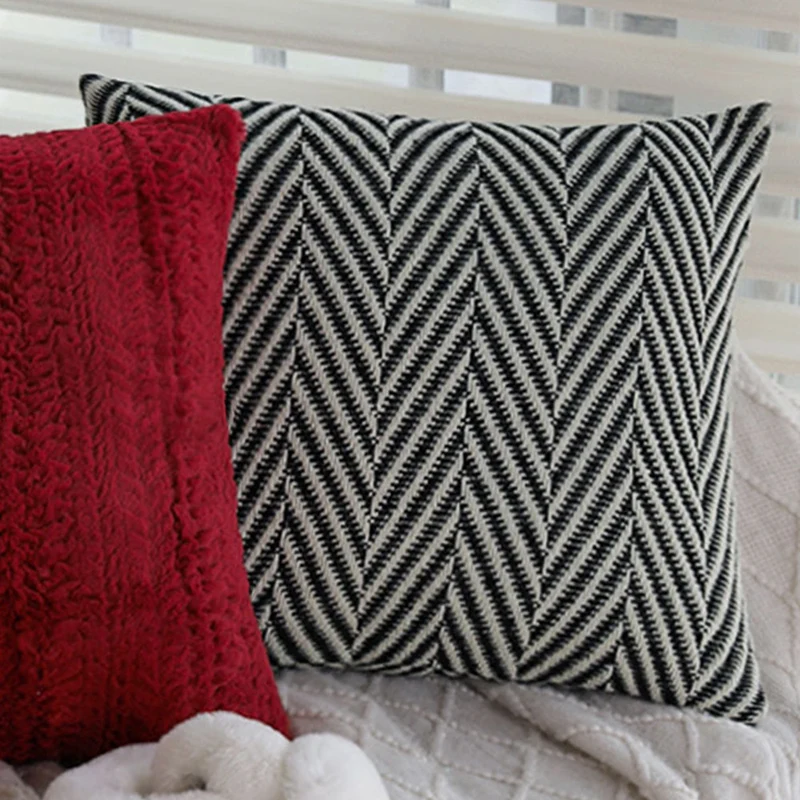 Square woven cushion cover with herringbone chevron structure and concealed zipper Stornfield