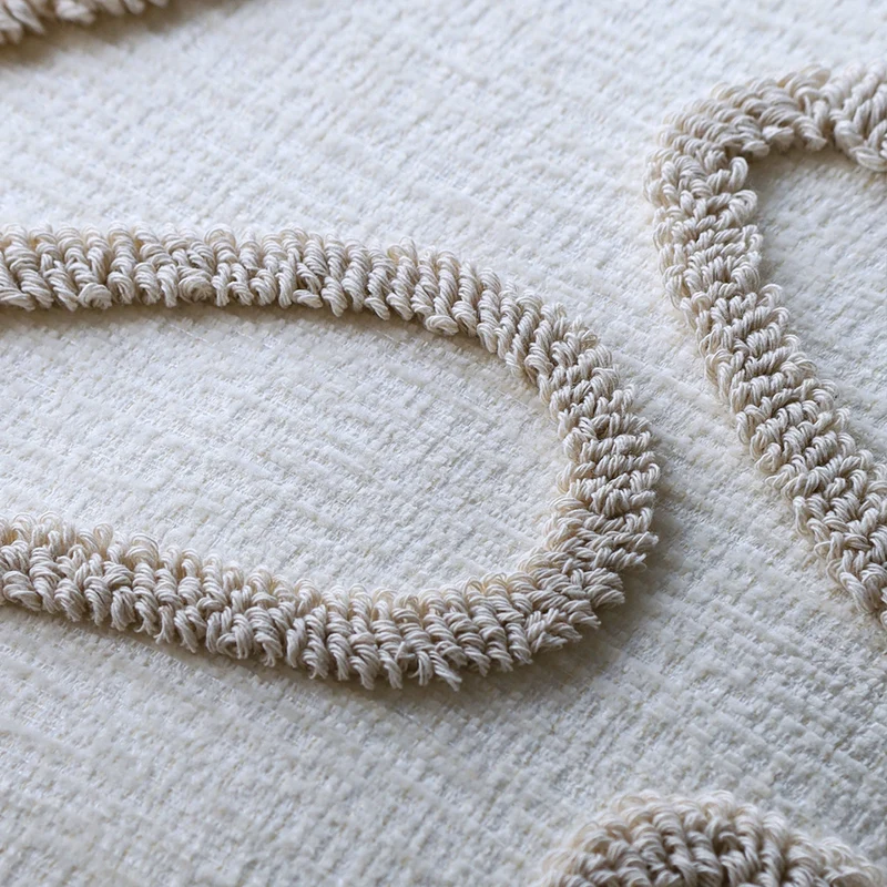 Square decorative cushion cover Stornfield with hand-tufted loop appliqué and fine linen look