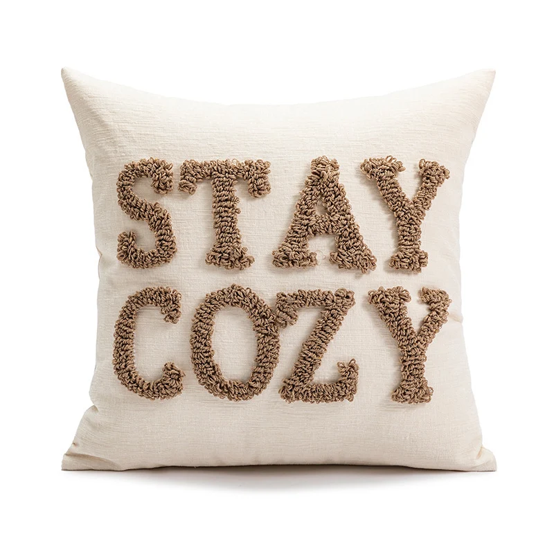 Square decorative cushion cover made of mottled boucle linen structure with fine piping Stornfield