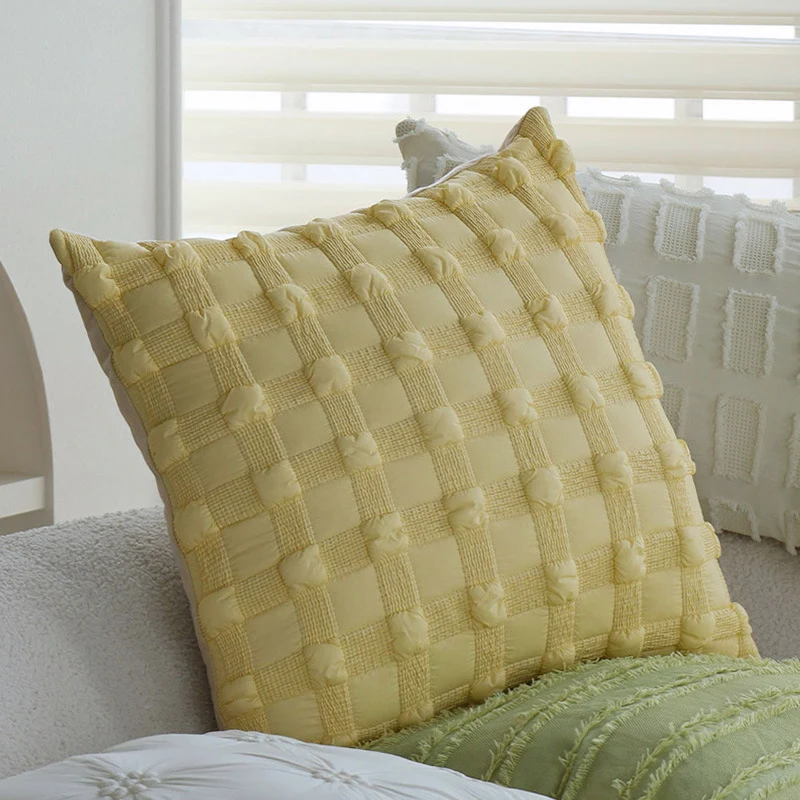 Square decorative pillow cover made of cotton blend with relief rectangular tufts and fringed edge Stornfield