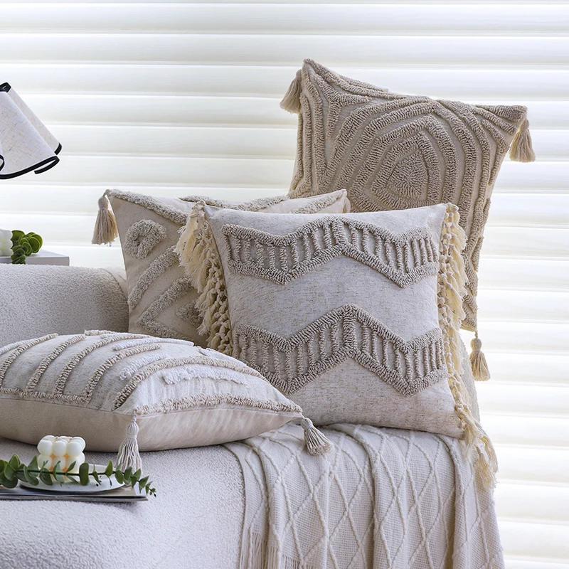 Square decorative cushion cover made of cotton-linen with hand-tufted stripe relief and corner tassels Stornfield