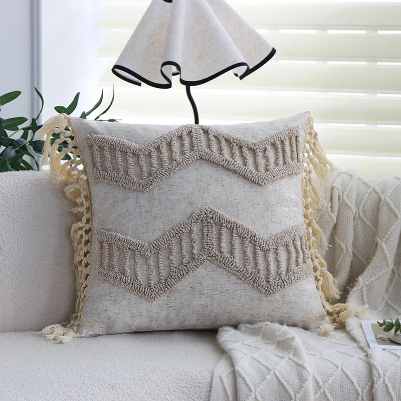Square decorative cushion cover made of cotton-linen with hand-tufted stripe relief and corner tassels Stornfield