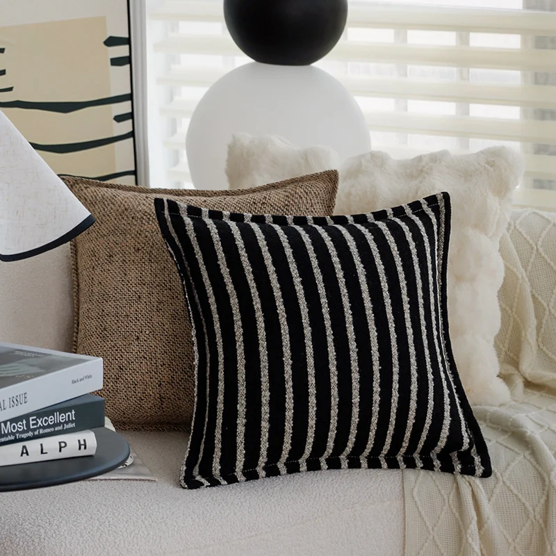 Square cushion cover with densely woven bouclé-tweed texture and decorative piping Stornfield