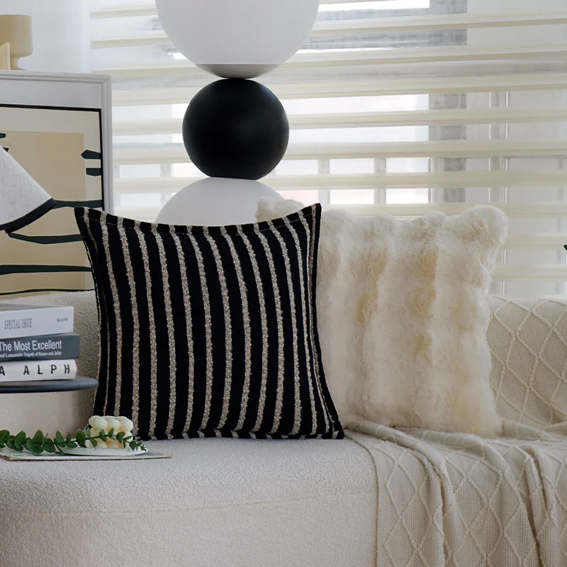 Square cushion cover with densely woven bouclé-tweed texture and decorative piping Stornfield