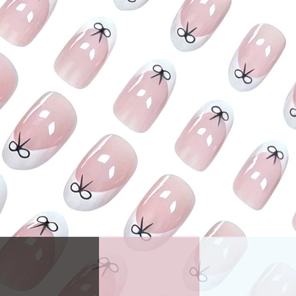 Artistic Bow-Embellished Nail Art Stornfield