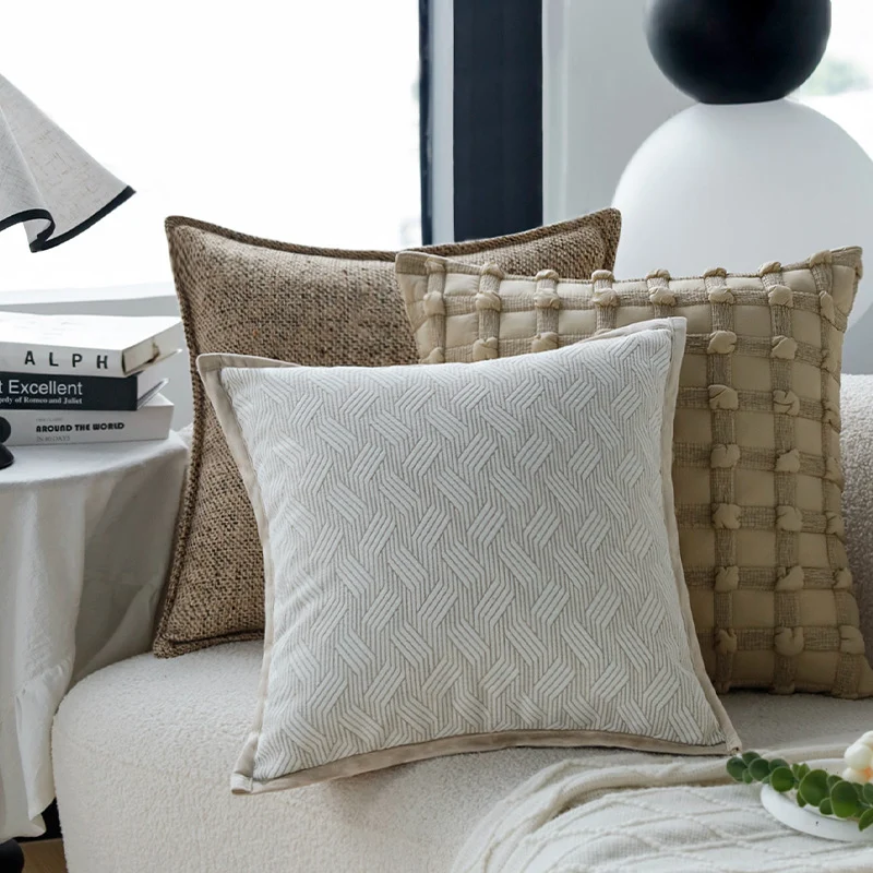 Square decorative cushion cover made of coarse woven bouclé with fine piping Stornfield