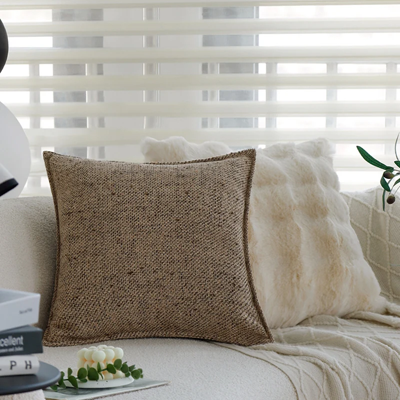 Square decorative cushion cover made of coarse woven bouclé with fine piping Stornfield