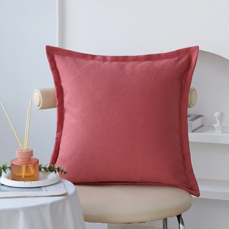 Square decorative cushion cover made of structured cotton blend with elegant piping edge Stornfield