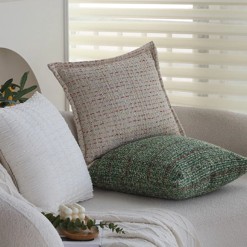Square bouclé cushion cover in tweed style with subtle multicolor tufting Stornfield