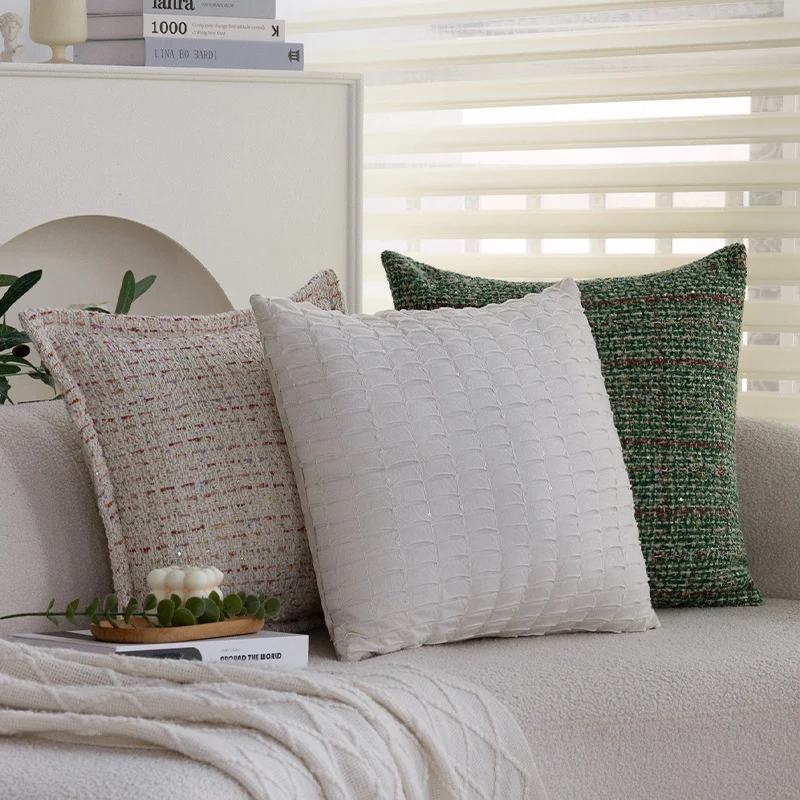 Square bouclé cushion cover in tweed style with subtle multicolor tufting Stornfield