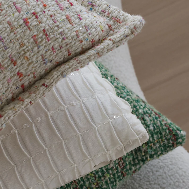 Square bouclé cushion cover in tweed style with subtle multicolor tufting Stornfield