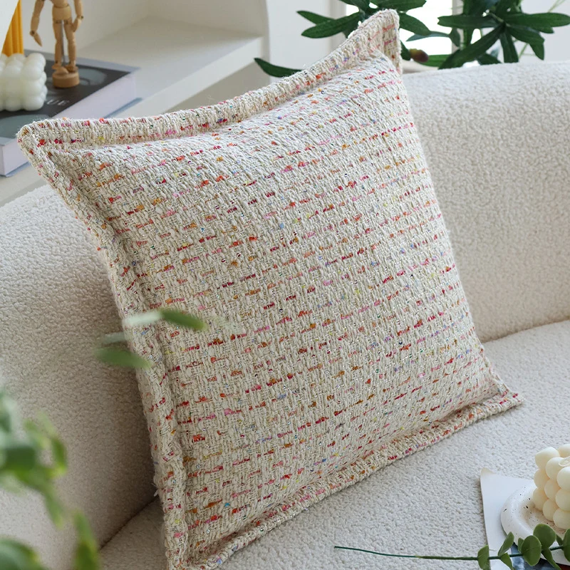 Square bouclé cushion cover in tweed style with subtle multicolor tufting Stornfield