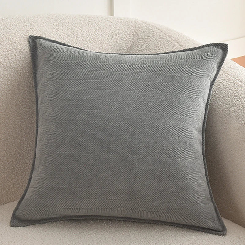 Square decorative cover with fine herringbone pattern and piping edge Stornfield
