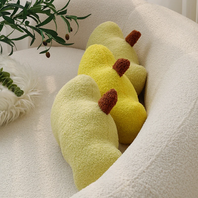 Kidney-shaped decorative cushion made of bouclé teddy with soft polyester filling Stornfield