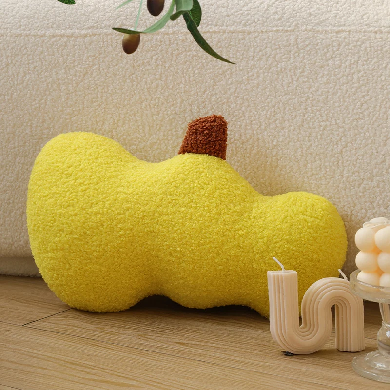 Kidney-shaped decorative cushion made of bouclé teddy with soft polyester filling Stornfield