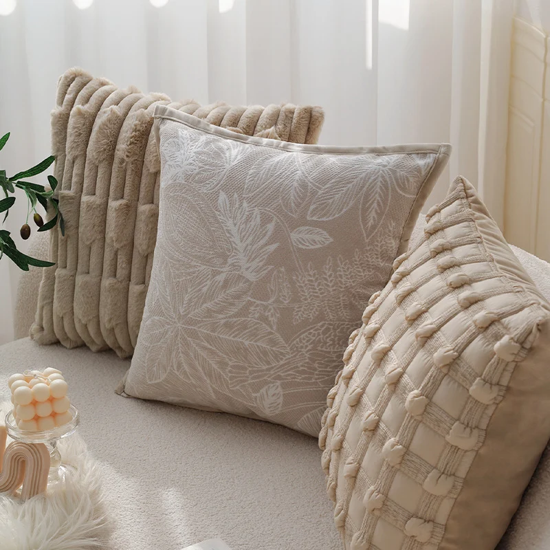 Cozy decorative sofa cushion with faux fur surface and quilted texture pattern Stornfield