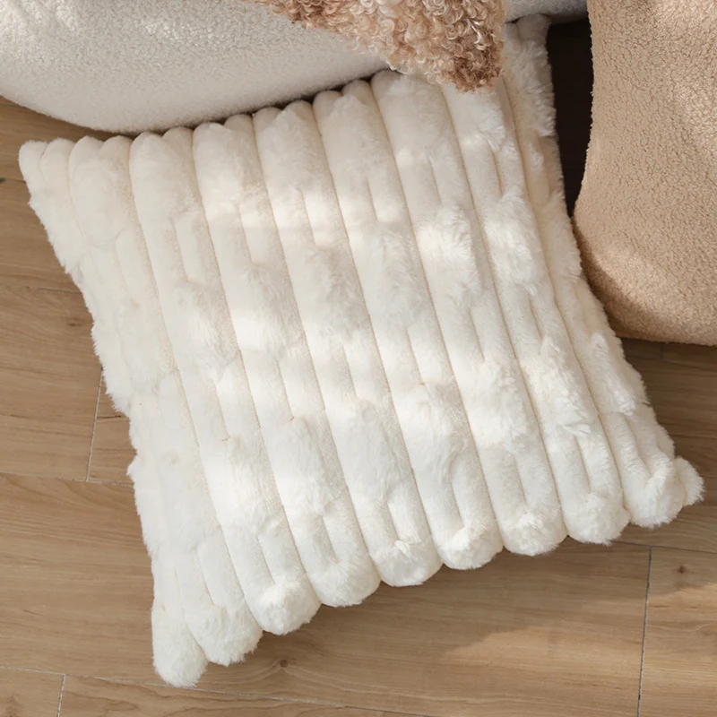Cozy decorative sofa cushion with faux fur surface and quilted texture pattern Stornfield