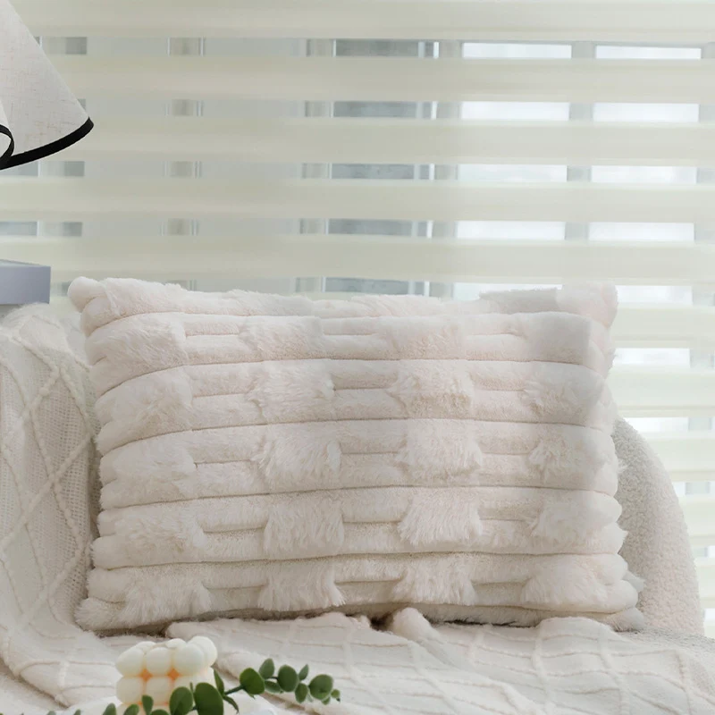 Cozy decorative sofa cushion with faux fur surface and quilted texture pattern Stornfield