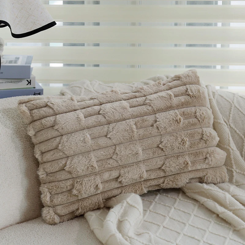 Cozy decorative sofa cushion with faux fur surface and quilted texture pattern Stornfield
