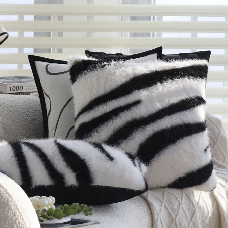 Faux fur decorative pillow with zebra print and extra soft pile Stornfield