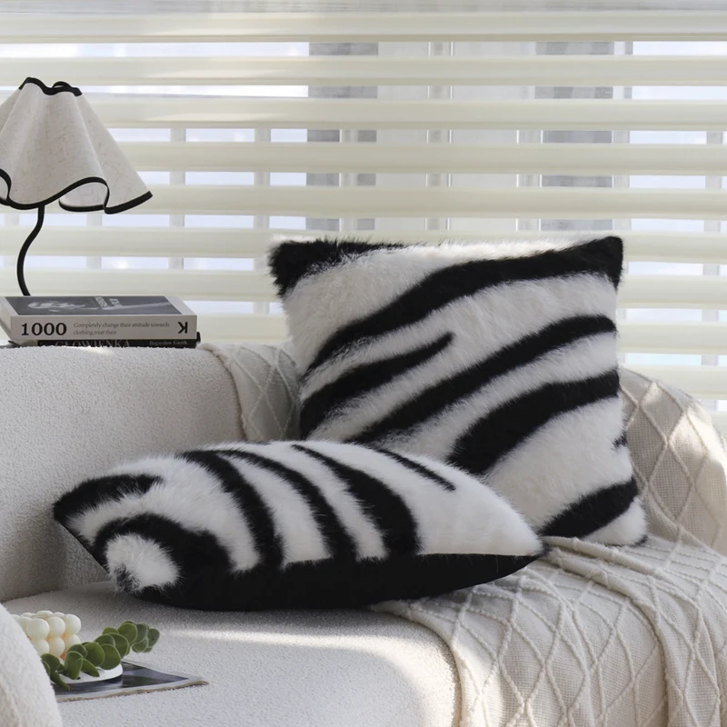 Faux fur decorative pillow with zebra print and extra soft pile Stornfield