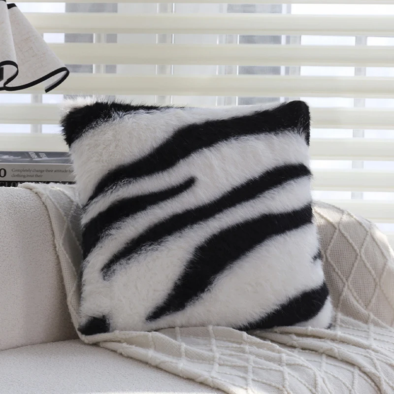 Faux fur decorative pillow with zebra print and extra soft pile Stornfield