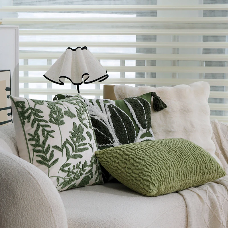 Cushion cover with tufted leaf relief and tassels Stornfield