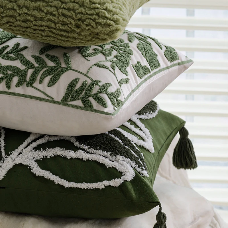 Cushion cover with tufted leaf relief and tassels Stornfield