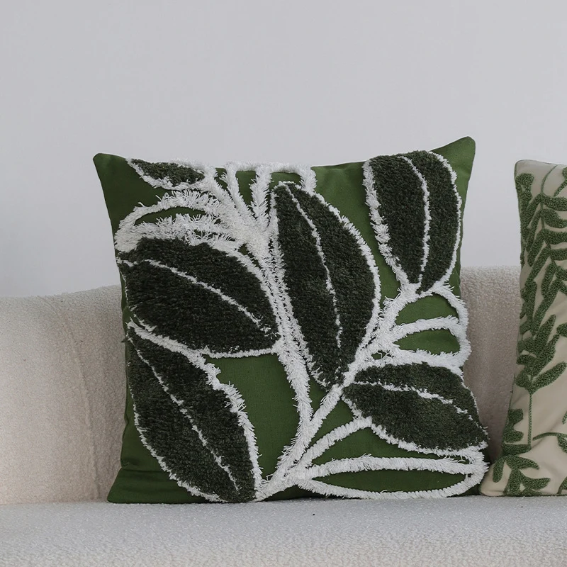 Cushion cover with tufted leaf relief and tassels Stornfield