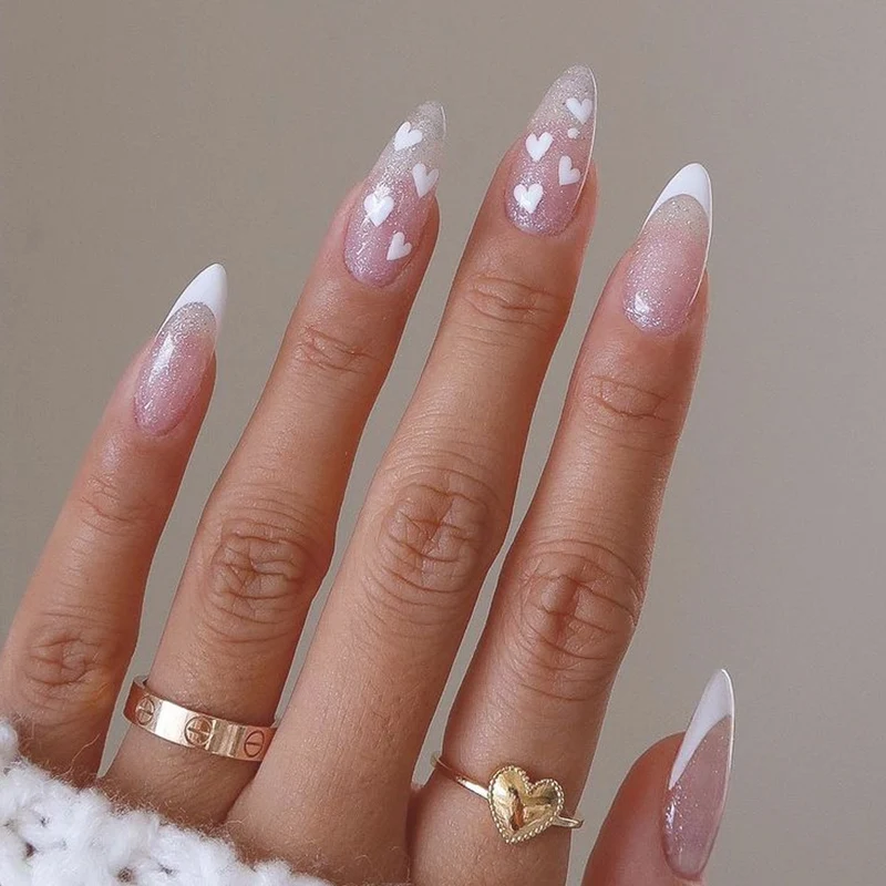 Heart-Patterned Acrylic Nail Art Extensions Stornfield