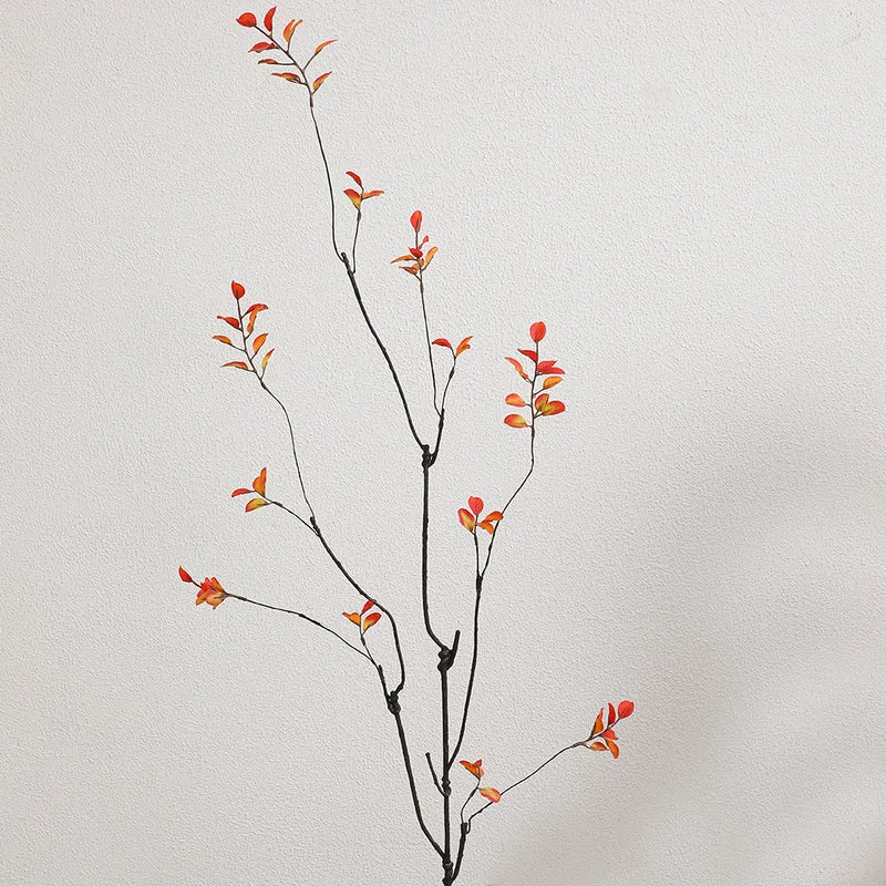 Künstlicher Blütenzweig mit lebendigen orangefarbenen Blüten Karnz