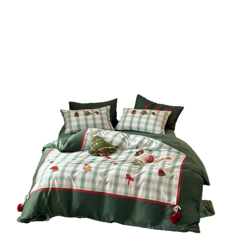 Christmas cotton satin bedding set with checked patchwork, embroidered applications and pompom details Stornfield