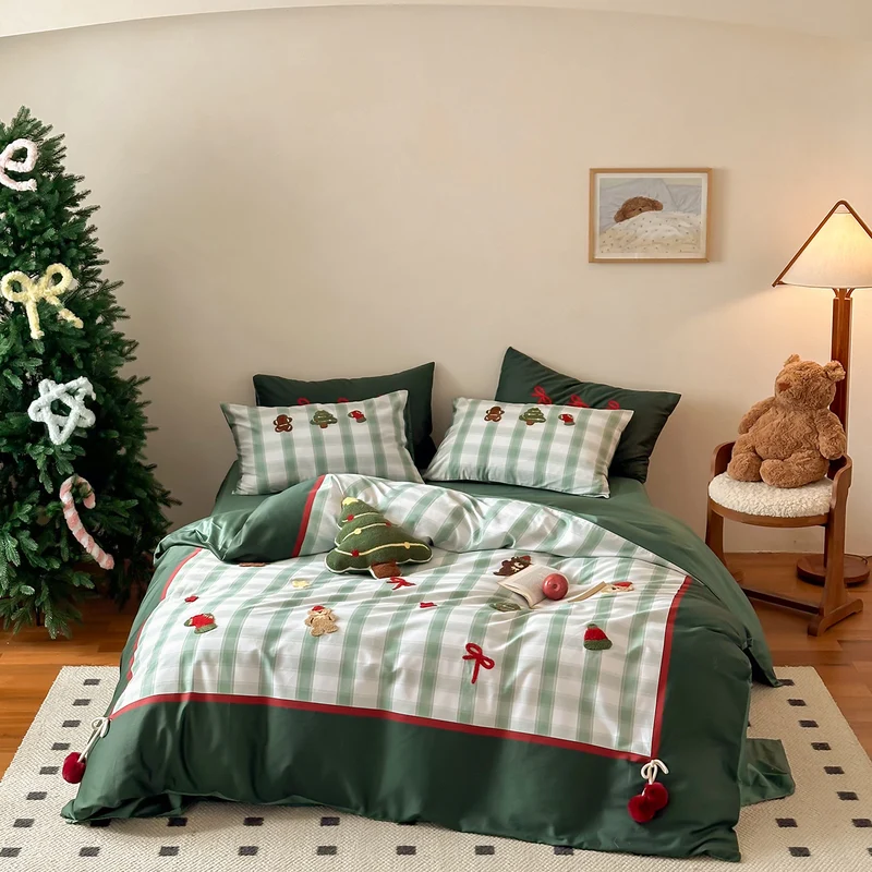 Christmas cotton satin bedding set with checked patchwork, embroidered applications and pompom details Stornfield