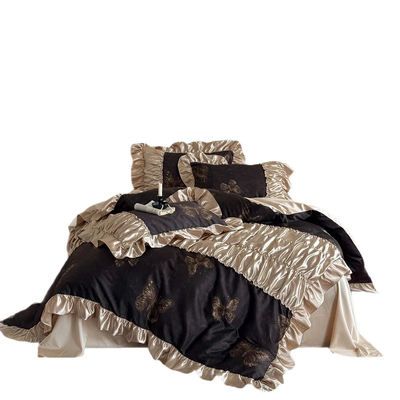 Silky shiny satin bedding set with butterfly pattern and voluminous ruffle frills Stornfield