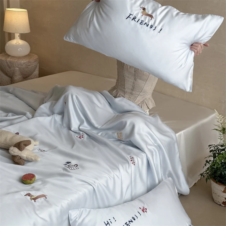 Silky-smooth satin bedding set with delicate embroidered icons Stornfield